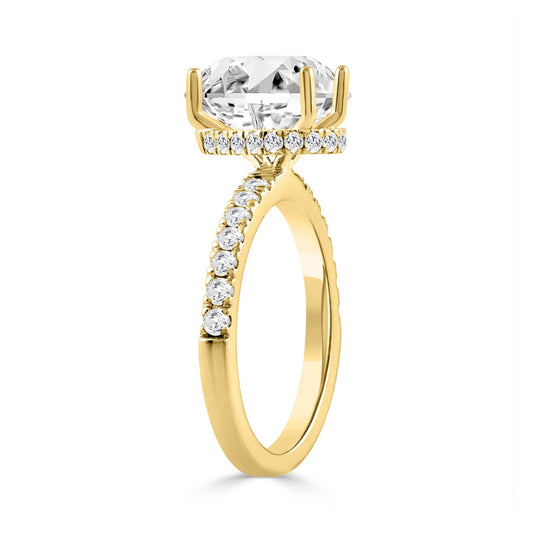 14K YELLOW GOLD 1/2CT ROUND/PEAR DIAMOND LADIES RING (CENTER STONE PEAR DIAMOND 2CT)